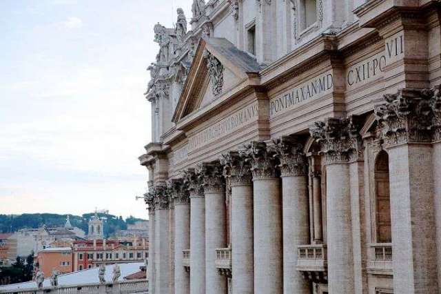 a_view_of_the_facade_of_st_peters_basilica_from_the_vaticans_apostolic_palace_credit_lauren_cater_cna